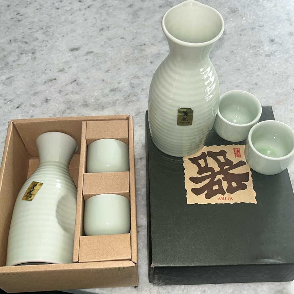 Two sake sets, vessel, and glasses